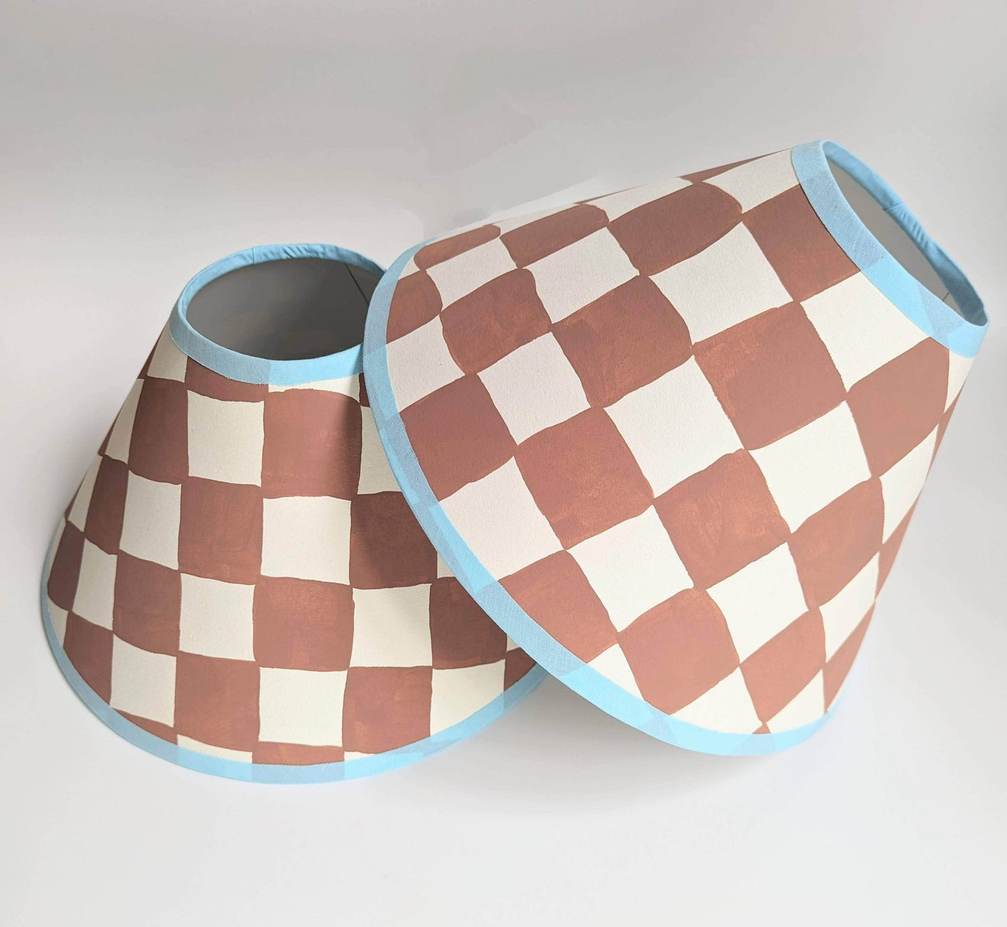 A Pair of Rust & Blue Checkerboard Hand Painted Lampshades