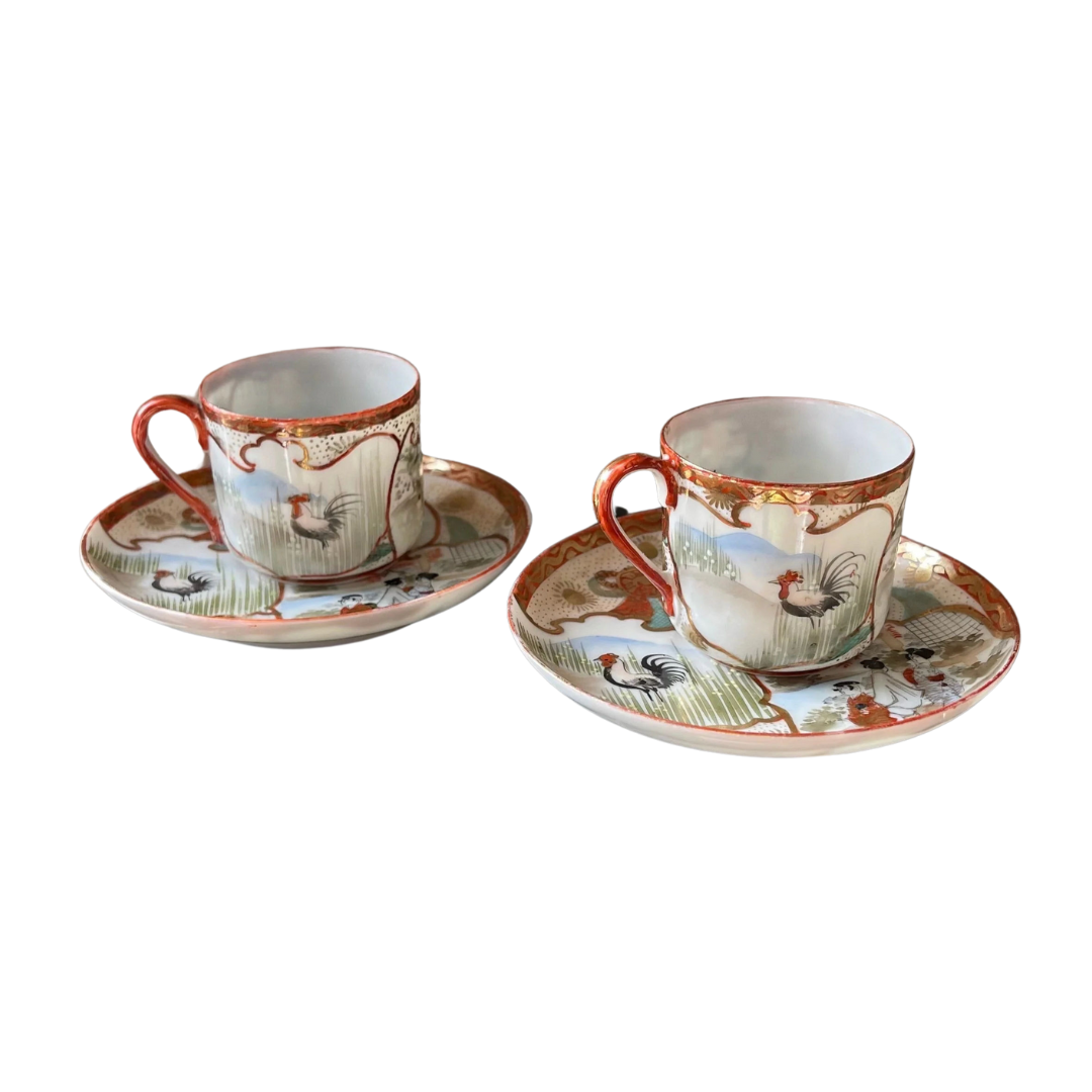 A Pair of Red Japanese Espresso Cups and Saucers