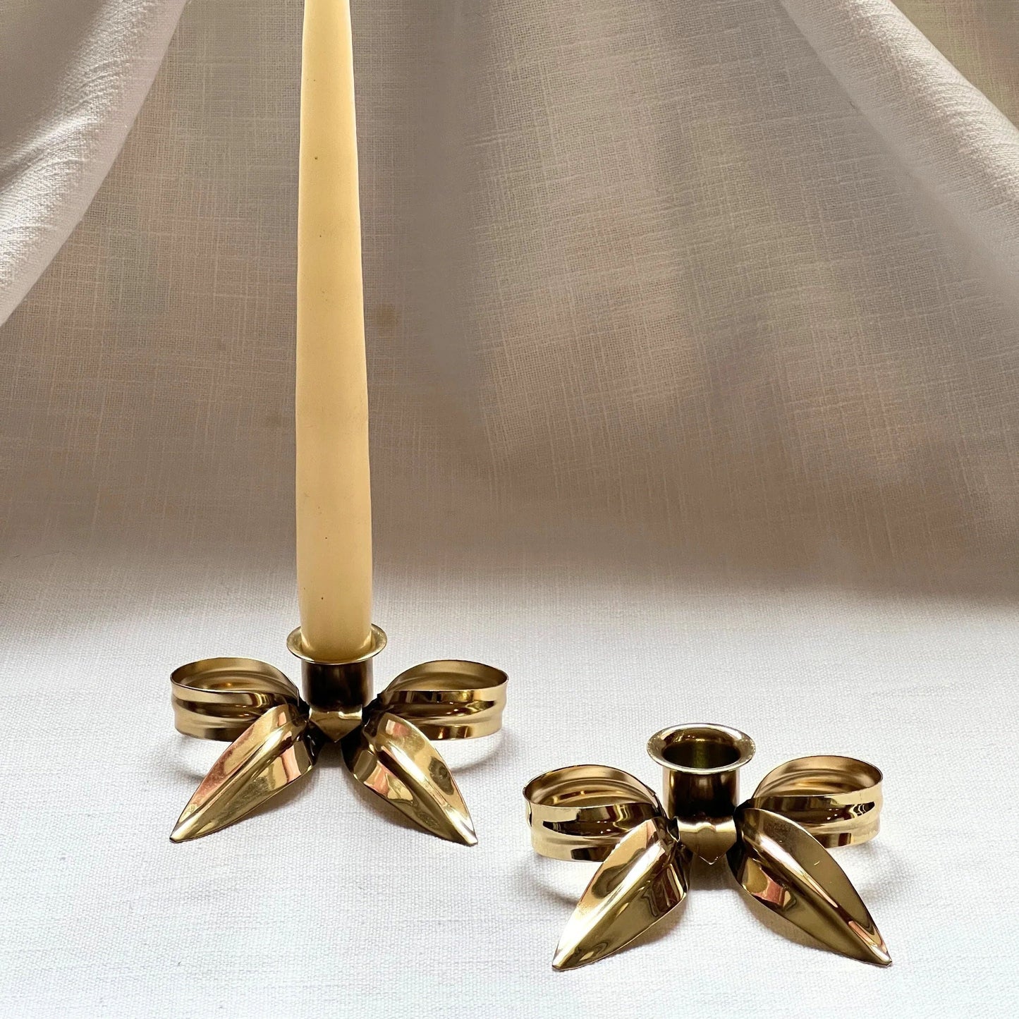 A Pair of Bow Candleholders - Brass