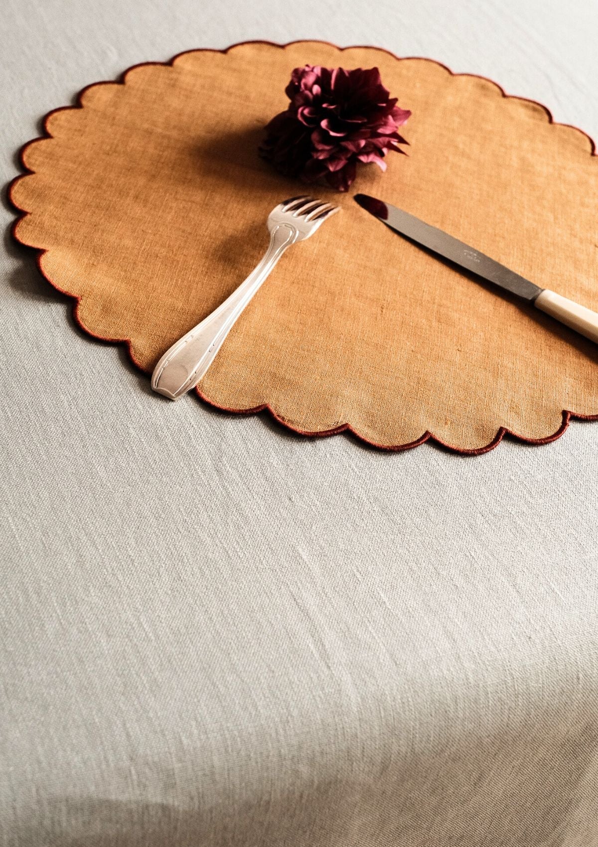 The Yellow and Red Ochre Linen Scalloped Round Placemats (Set of 2)