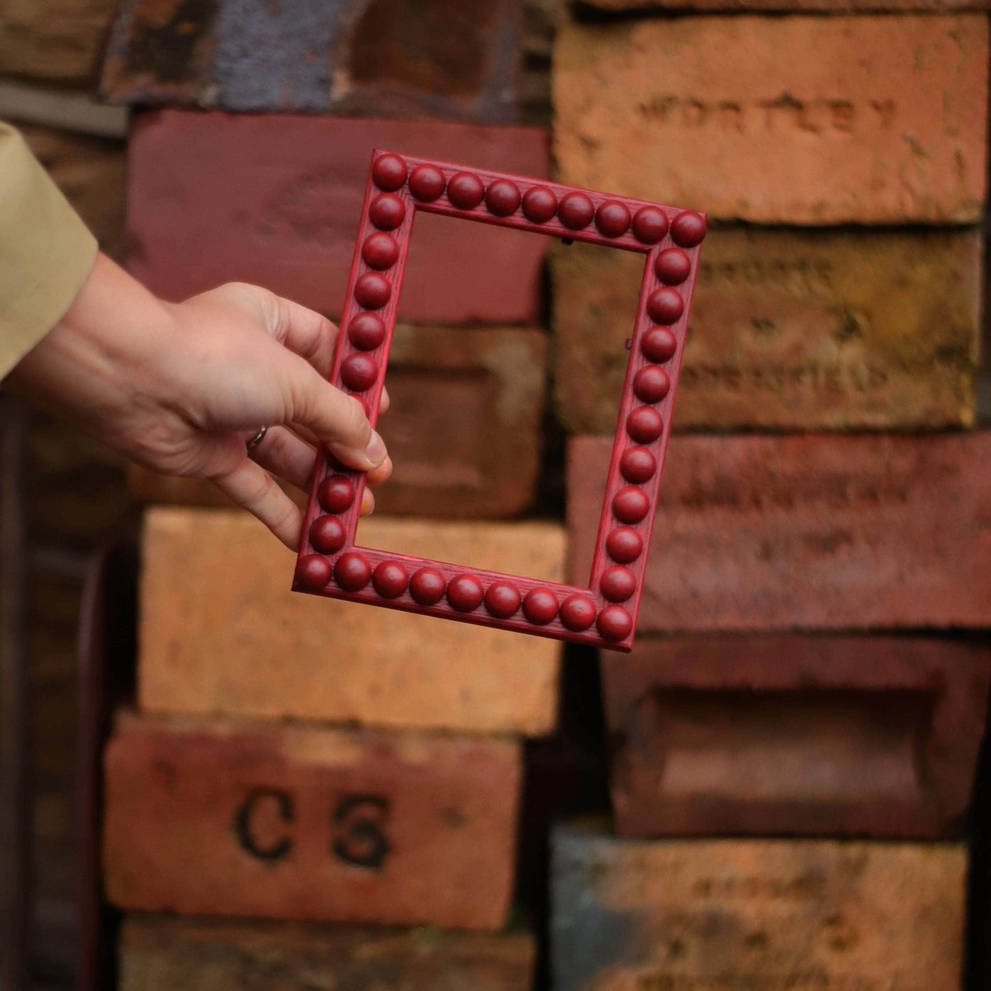 Brick Red Stained Bobbin Frame